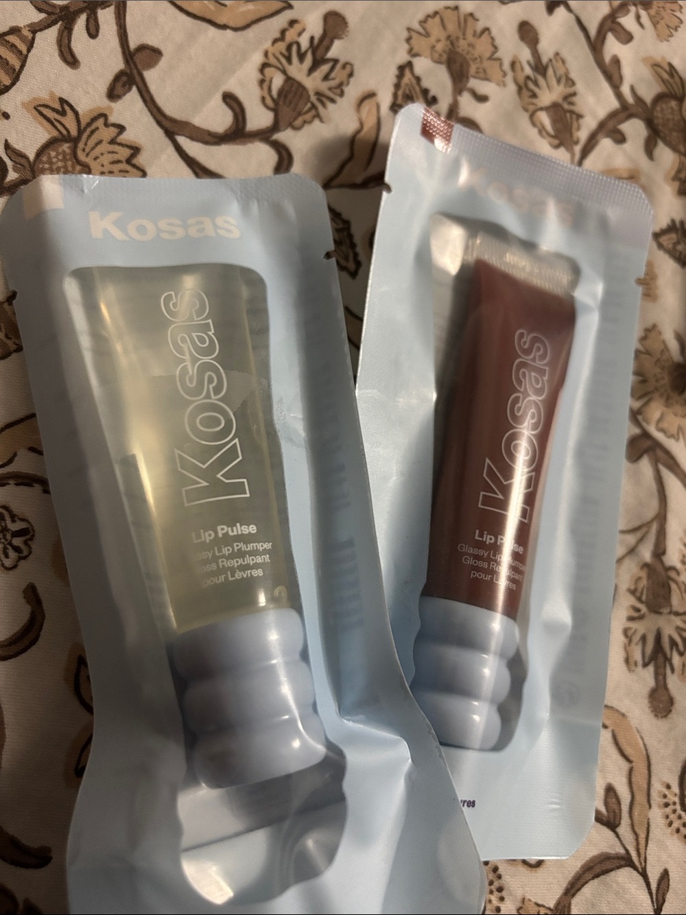 Kosas Lip Pulse Duo – Clear and Mauve-Taupe Glosses